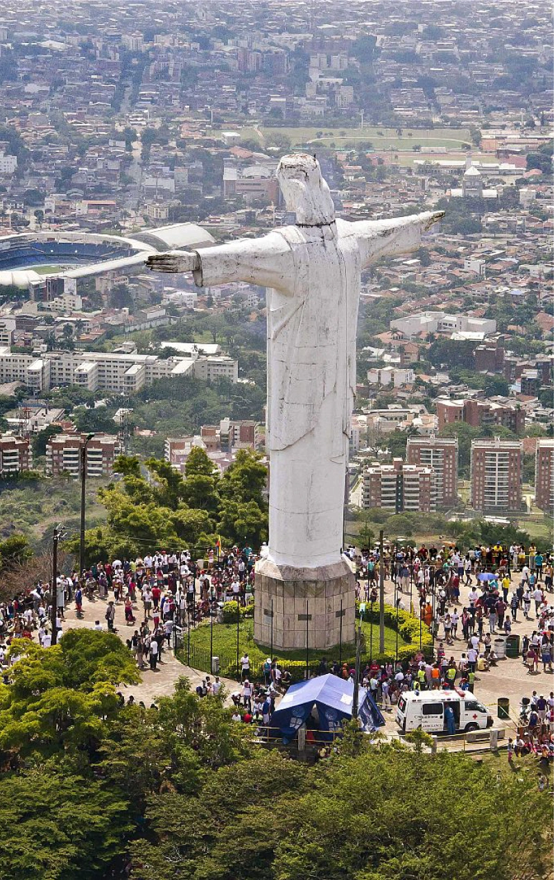 The Cristo Rey statue overlooking Cali, Colombia, a popular cultural site near BJJ Camps in South America.